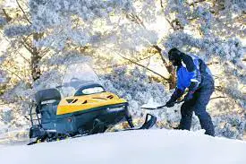 How much does a snowmobile weigh
