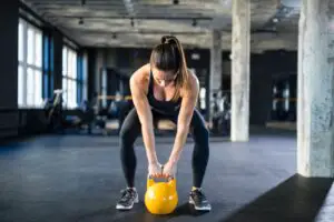 What weight kettlebell should a woman use