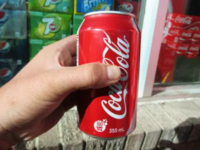 How big is a coke can in cm