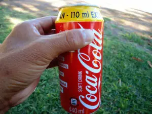 How big is a coke can in cm