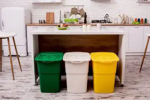 What is the height range for a pedal-operated trash can?